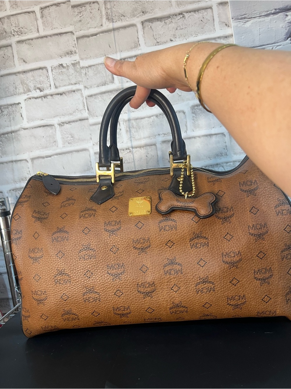 MCM Cognac Visetos Duffel with Black Handles and Gold Hardware